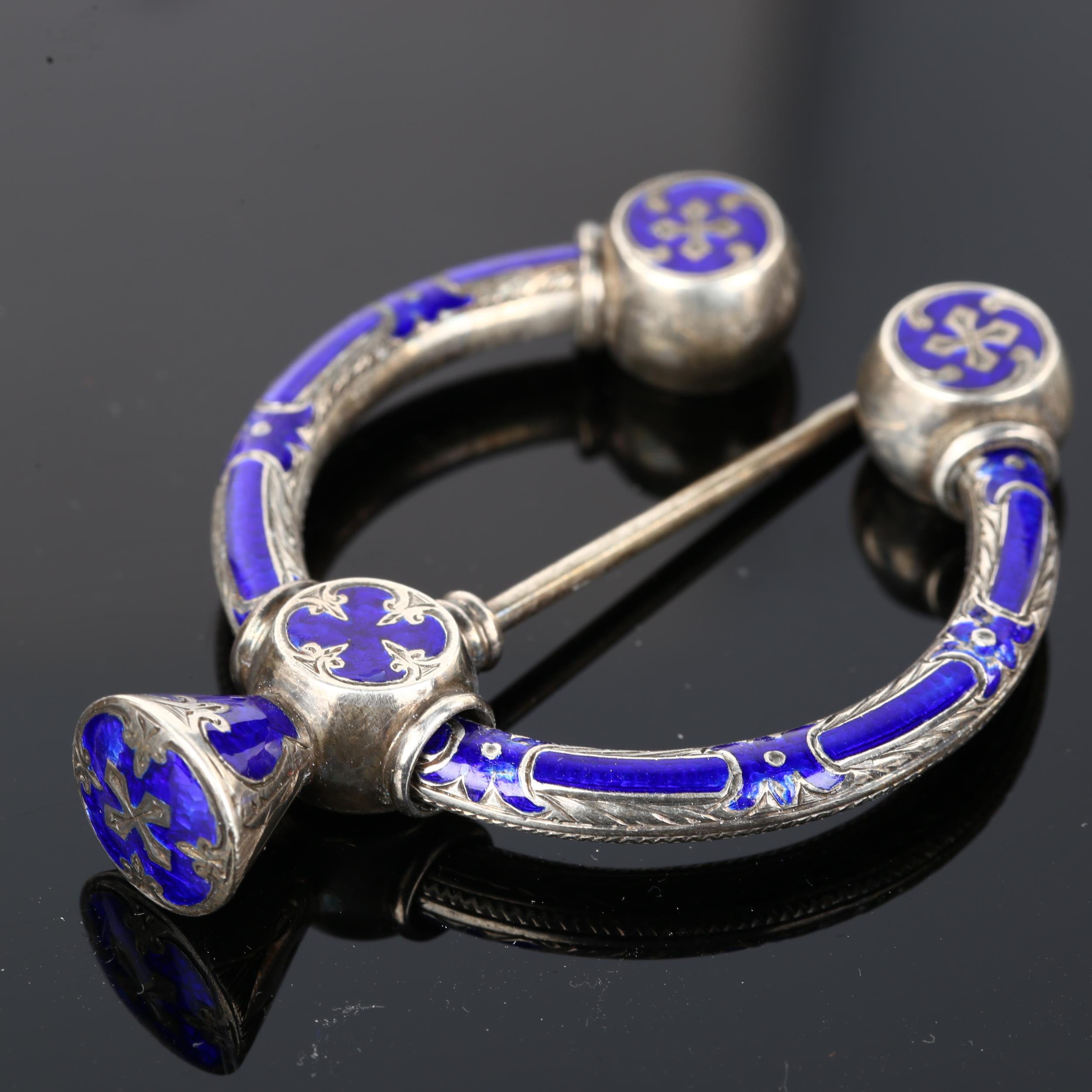 A 19th century Scottish Celtic blue enamel penannular brooch, unmarked silver settings with - Image 2 of 4