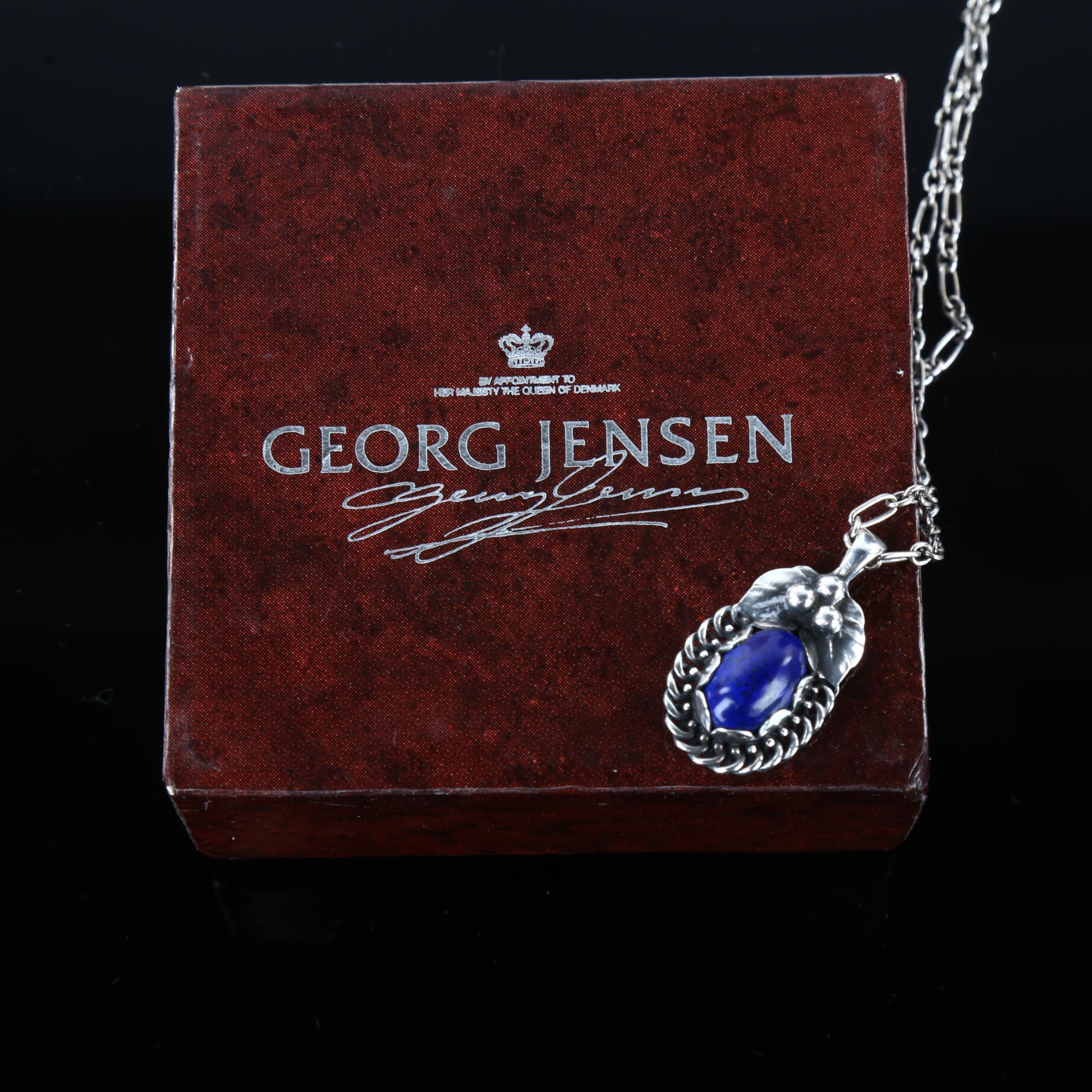 GEORG JENSEN - a Danish stylised sterling silver and lapis lazuli pendant necklace of the year 1992, - Image 4 of 4