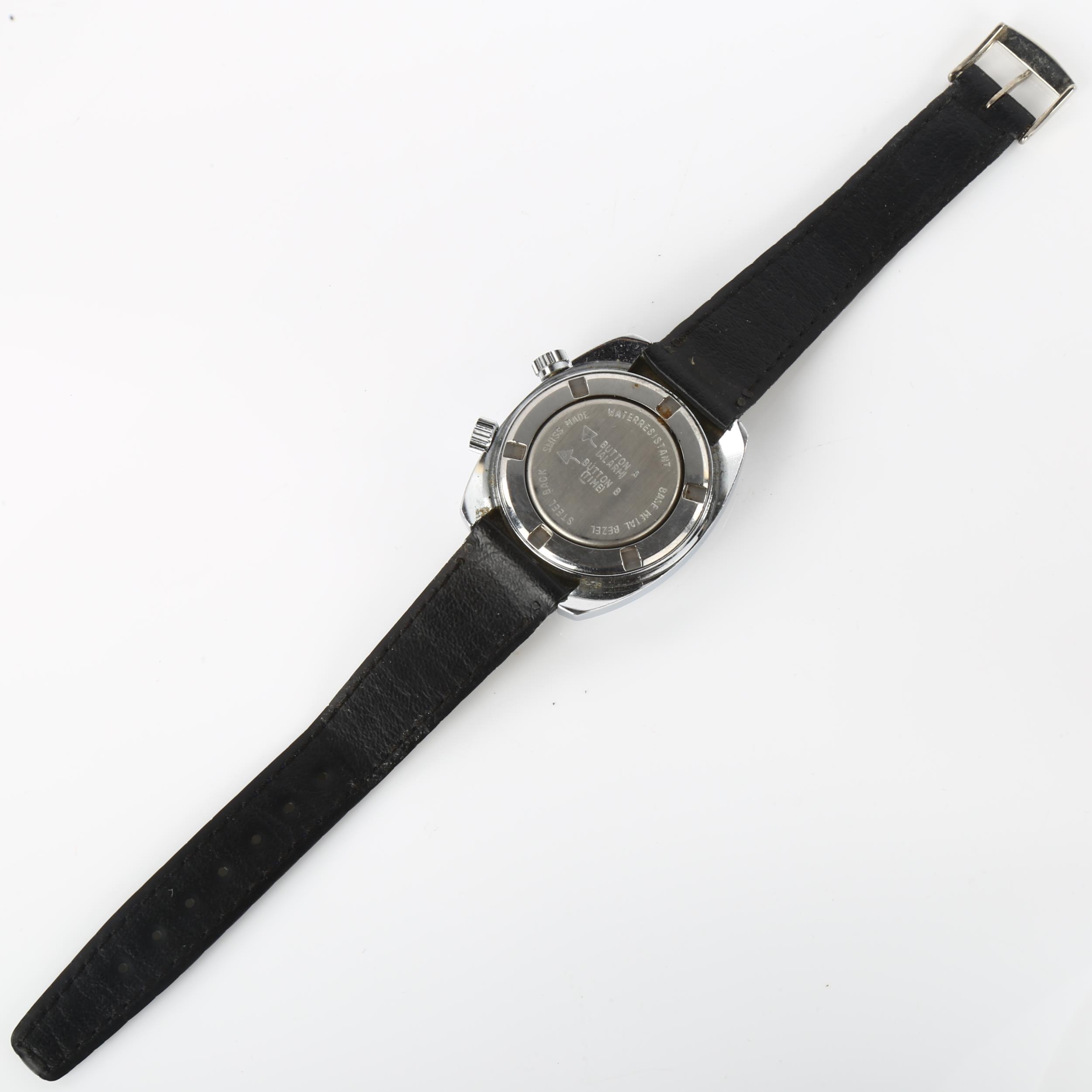 MEMOSTAR - a Vintage stainless steel alarm mechanical wristwatch, circa 1970s, oval blue dial with - Image 3 of 5