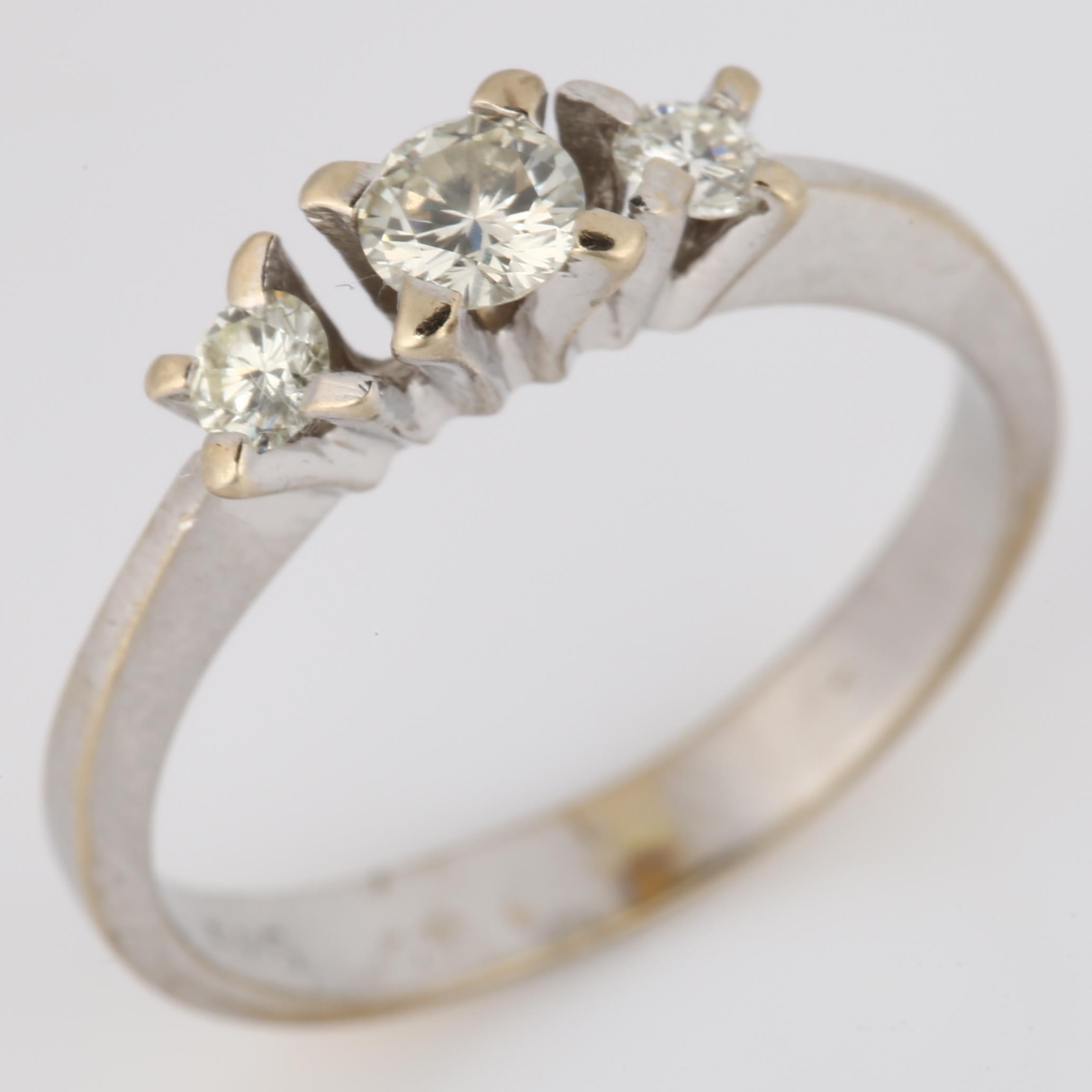 A Continental 14ct white gold three stone diamond ring, set with modern round brilliant-cut - Image 2 of 4
