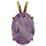 A 14ct gold amethyst pendant, prong set with oval mixed-cut amethyst, pendant height 23.5mm, 4.2g No