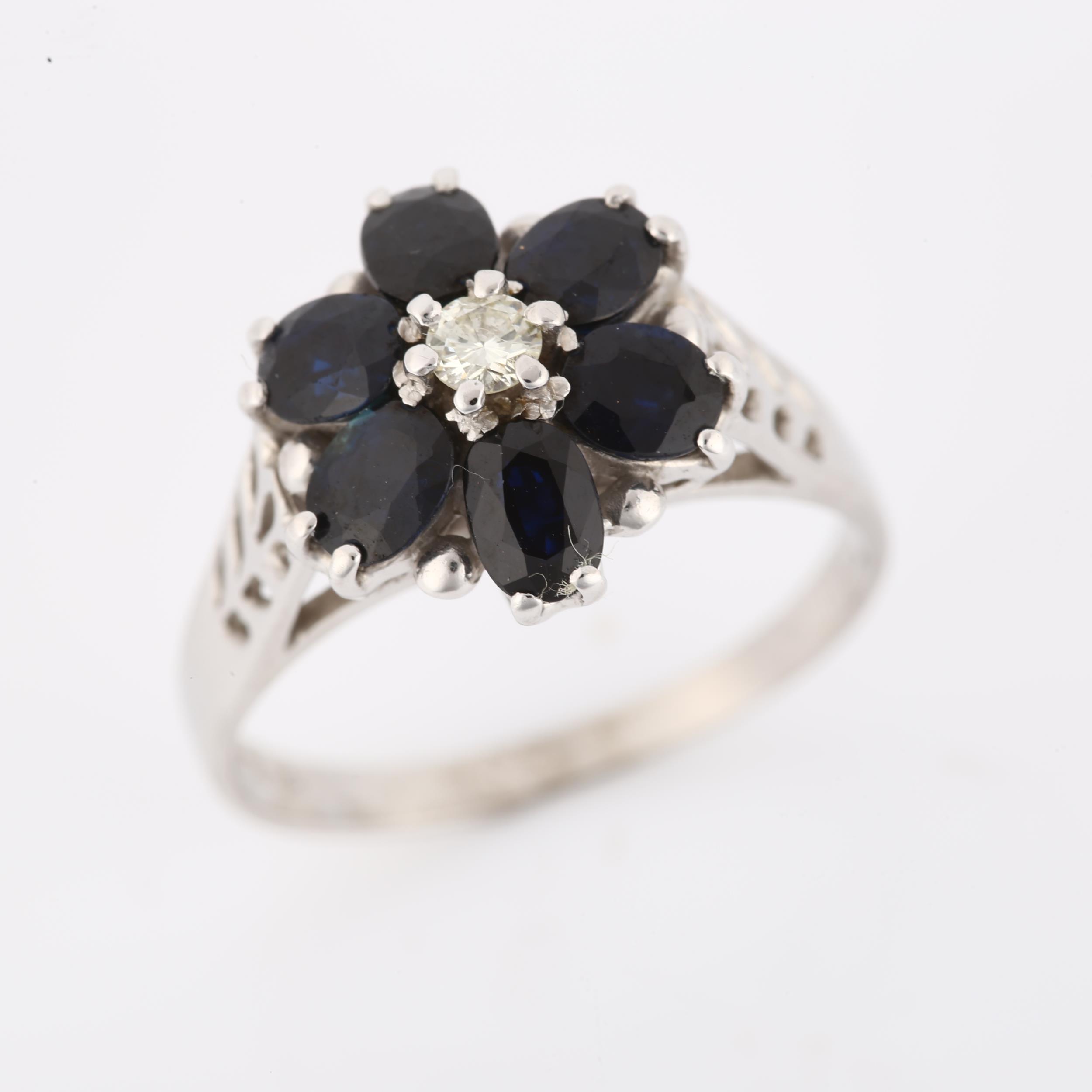 An 18ct white gold sapphire and diamond cluster flowerhead ring, set with oval mixed-cut sapphire - Image 2 of 4