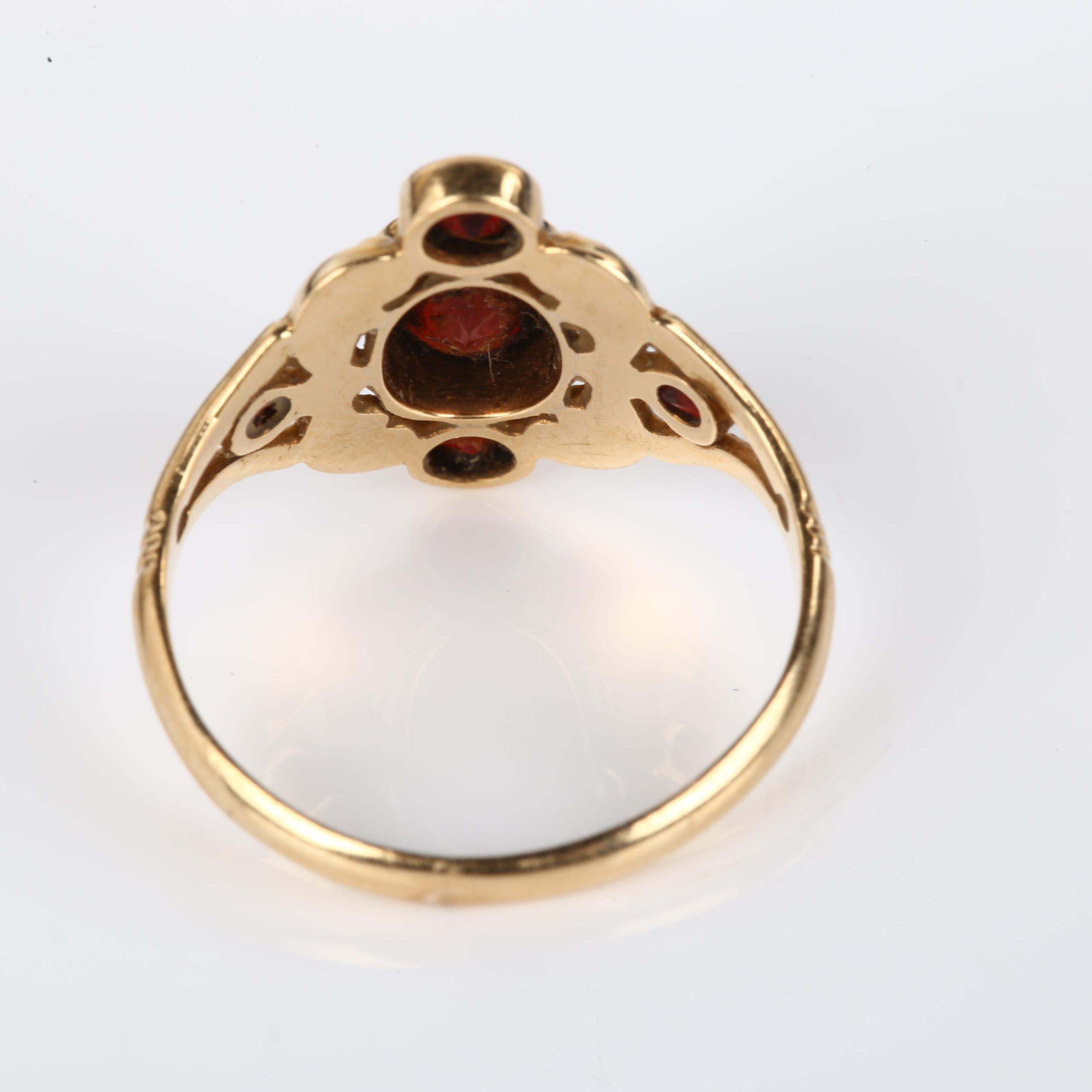 A 14ct gold garnet dress ring, set with rose-cut garnets and foliate decoration, maker's marks CN, - Image 3 of 4