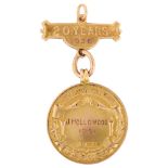 An Art Deco 9ct gold London Midland & Scottish Railway Ambulance Centre Long Service Medal,