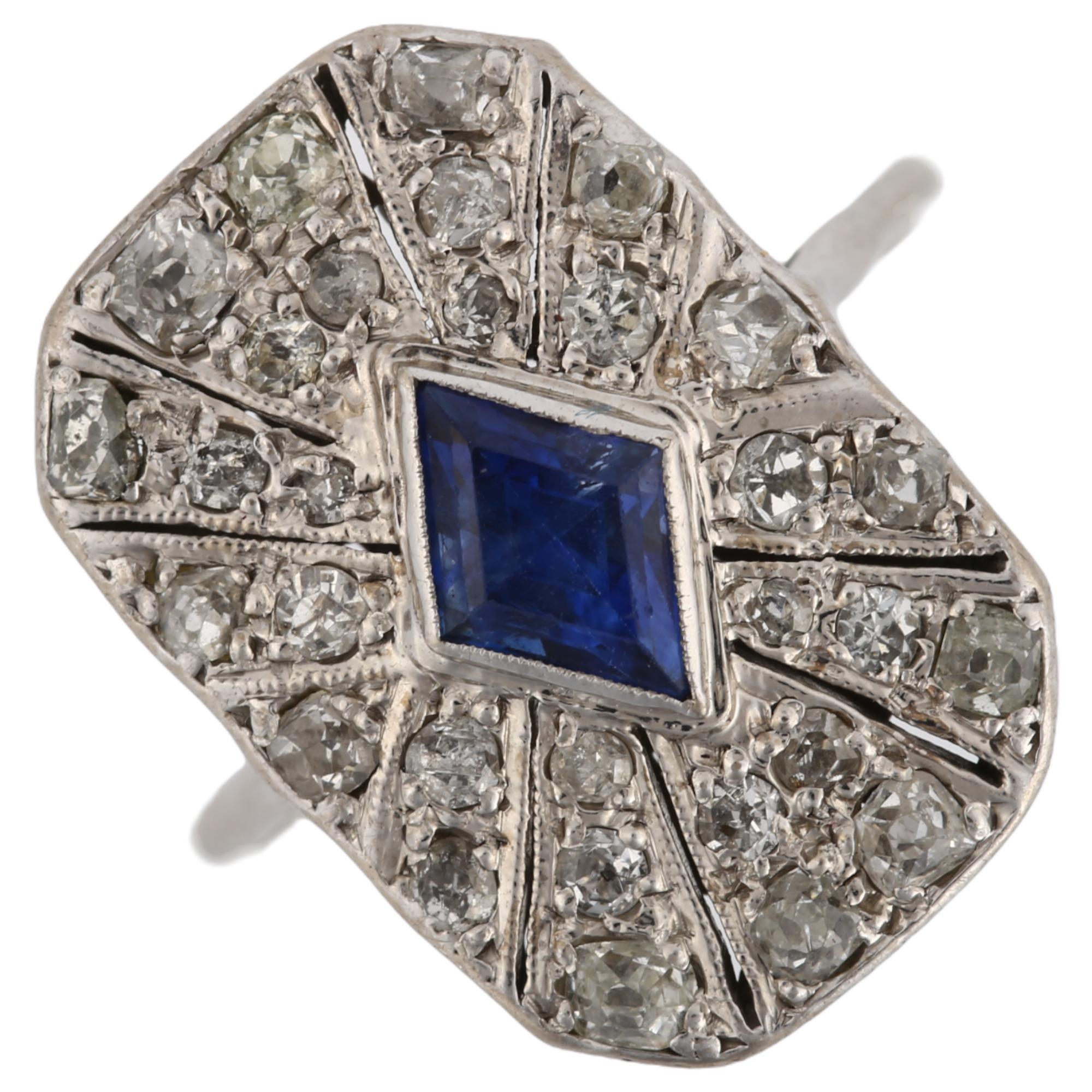 An Art Deco sapphire and diamond panel ring, unmarked white metal settings with lozenge step cut