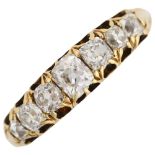 An 18ct gold seven stone diamond half hoop ring, set with old-cut diamonds, total diamond content