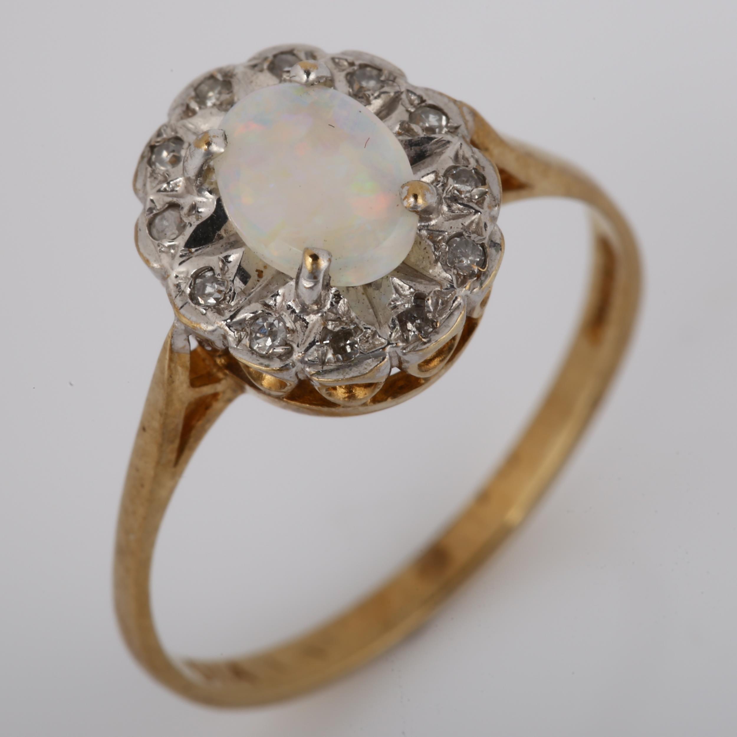 A 9ct gold opal and diamond cluster ring, set with oval cabochon opal and single-cut diamonds, - Image 2 of 4