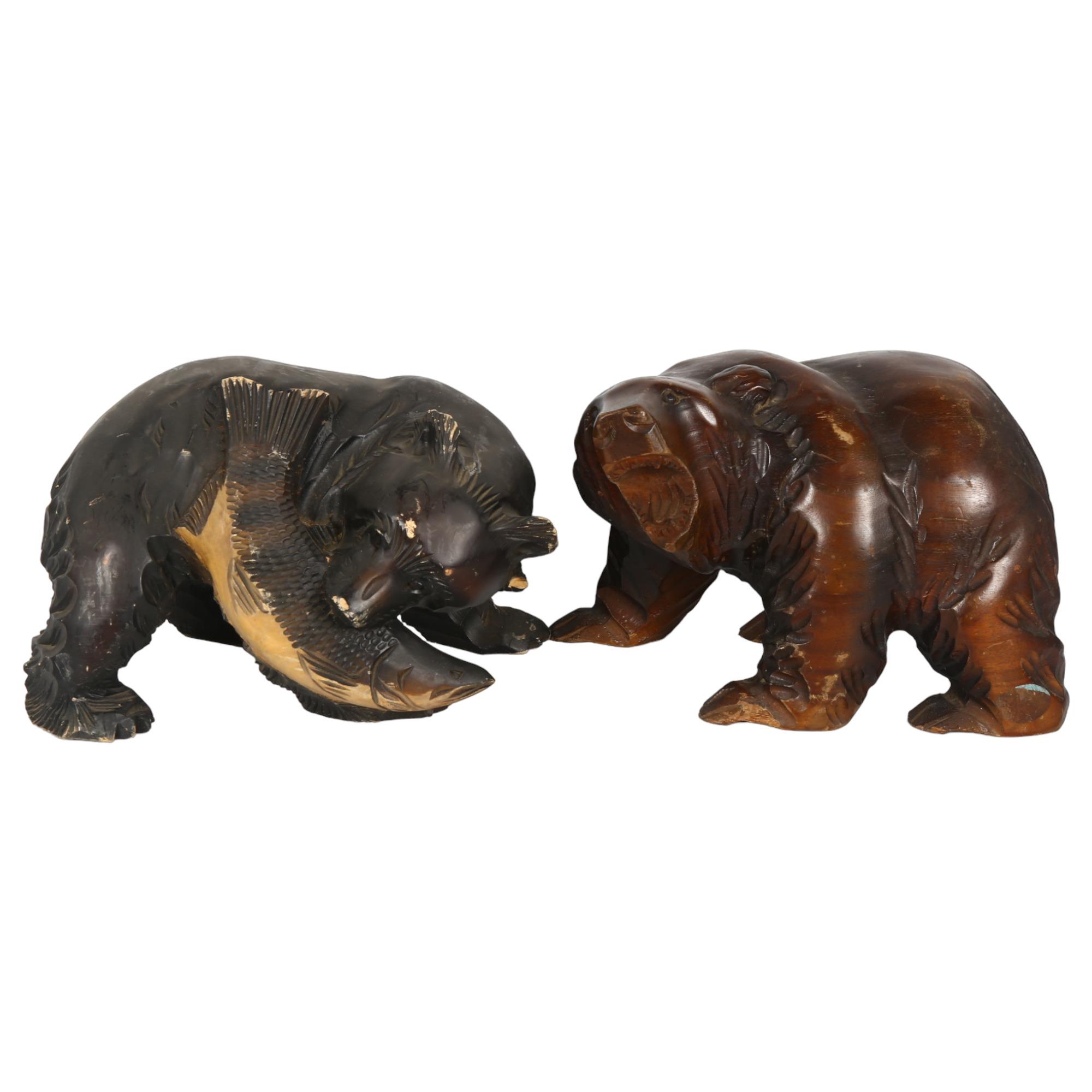 2 similar Hokkaido style pine bear sculptures, 1 with salmon in mouth, largest length 30cm (2)