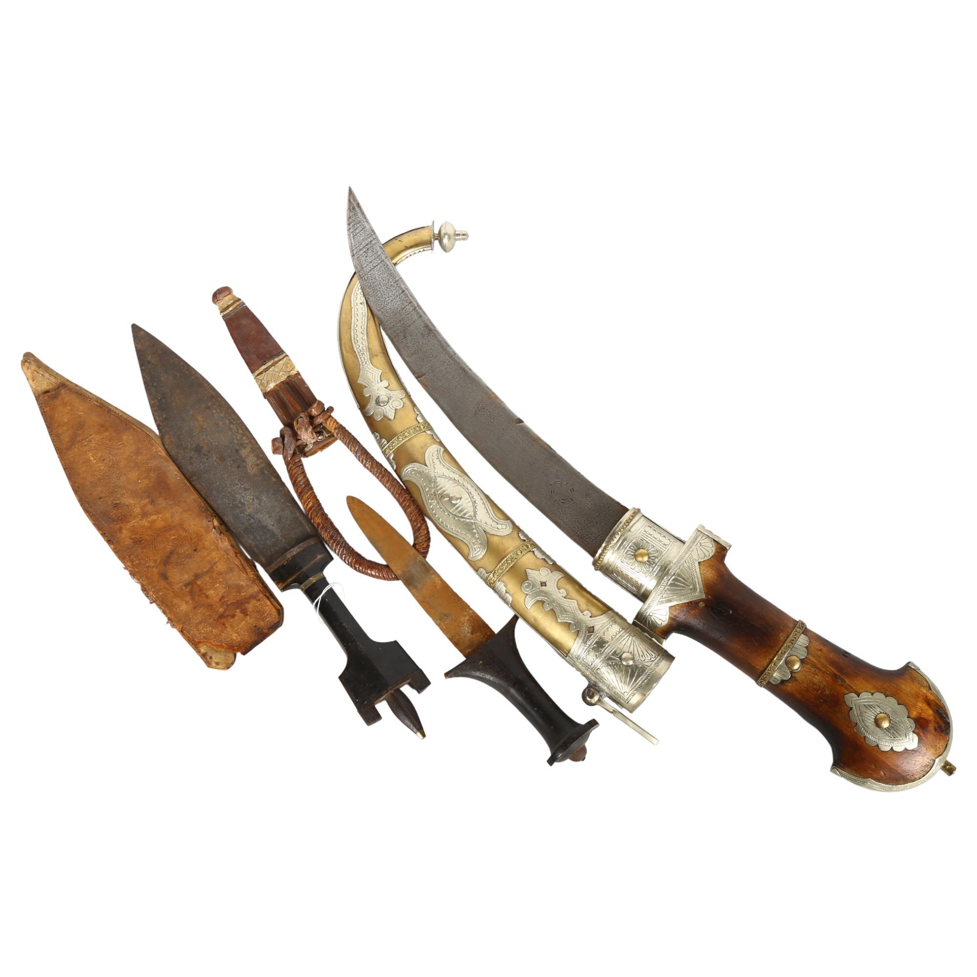 A Middle Eastern jambiya, and 2 horn-handled daggers (3)