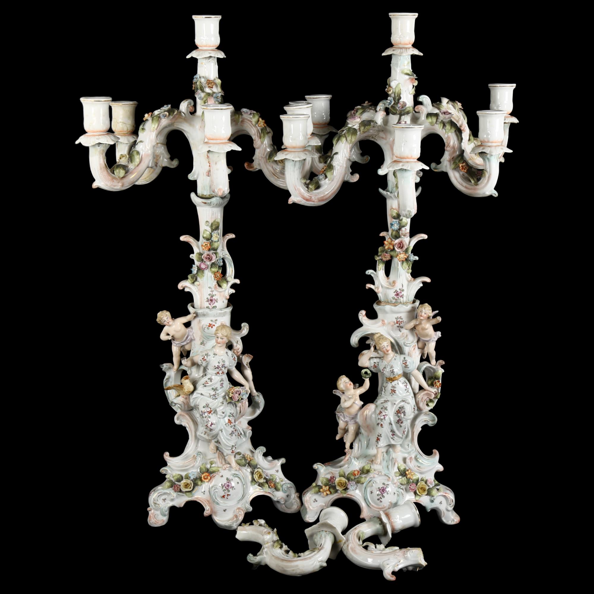 A pair of Antique German 6-branch table candelabras, encrusted with painted flowers, figures and