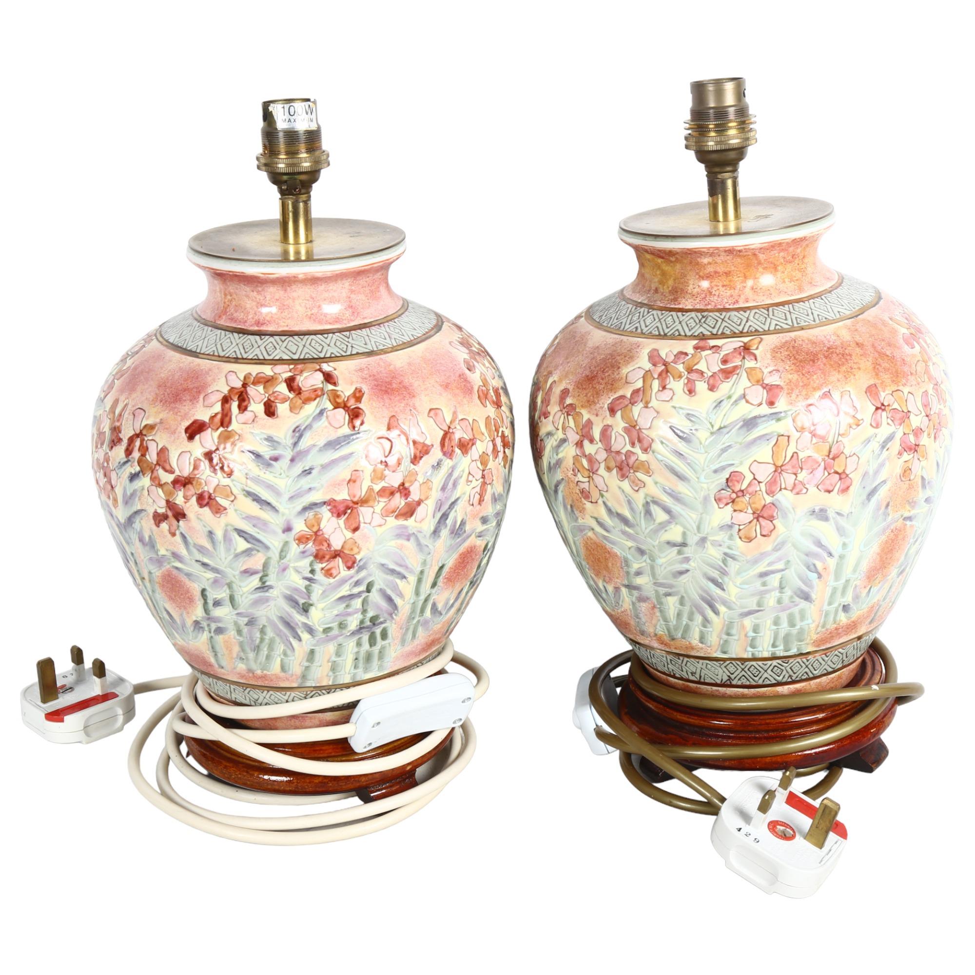 A pair of modern ceramic desk lamps, with floral design, H32cm