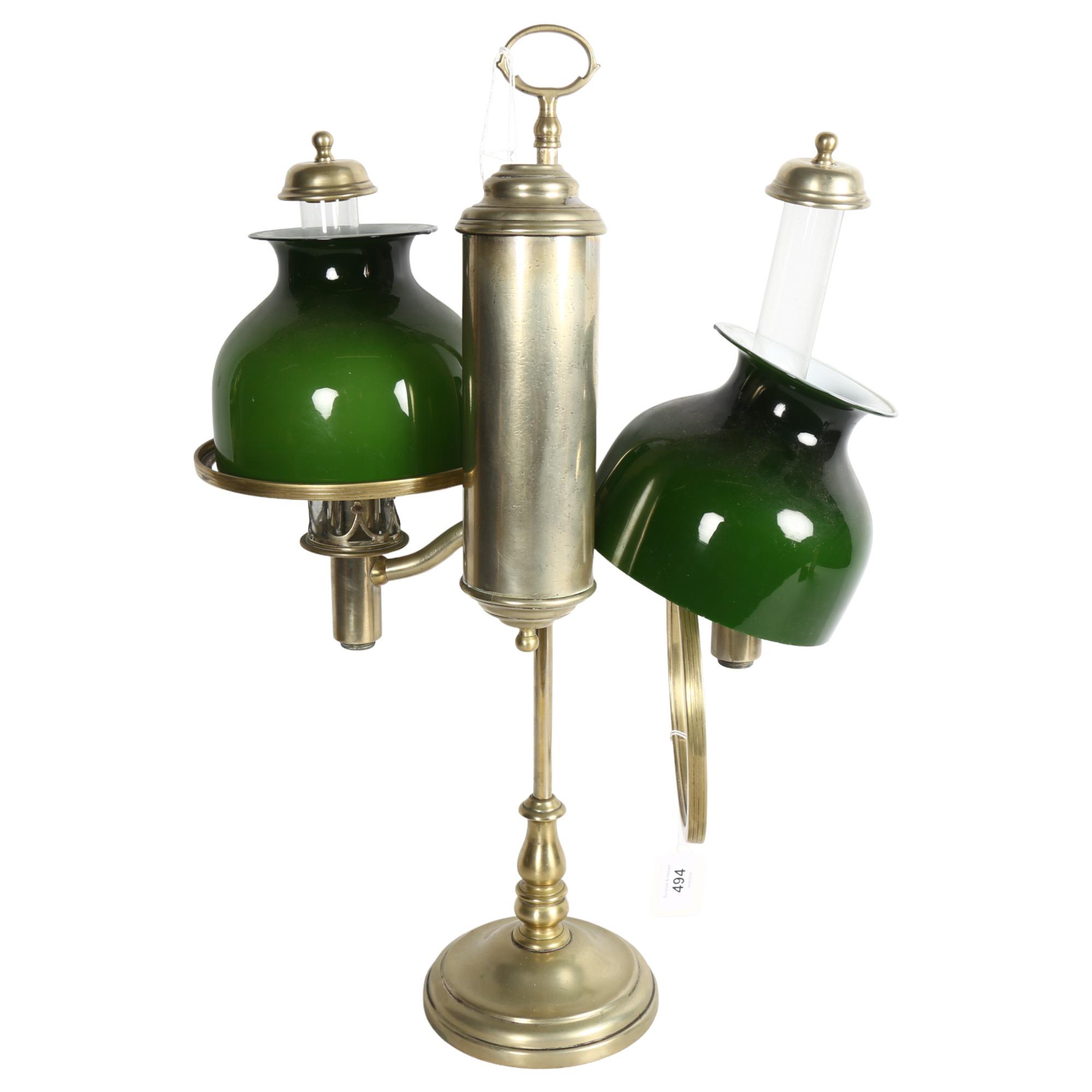 MILLER & SONS PICADILLY - a polished brass double adjustable student's oil lamp, with green glass