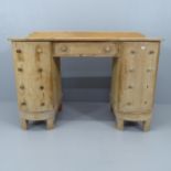 A pine dressing table with single drawer and slide fitted pedestals with dummy draw fronts. 120 x 85