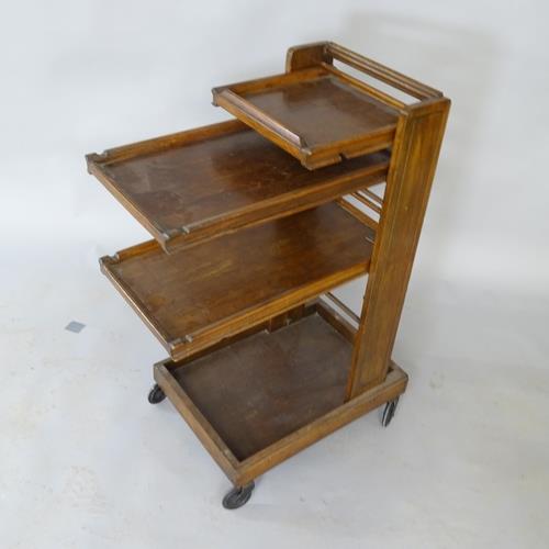 A 1930s stained wood trolley, with 3 adjustable cantilever trays, H93cm