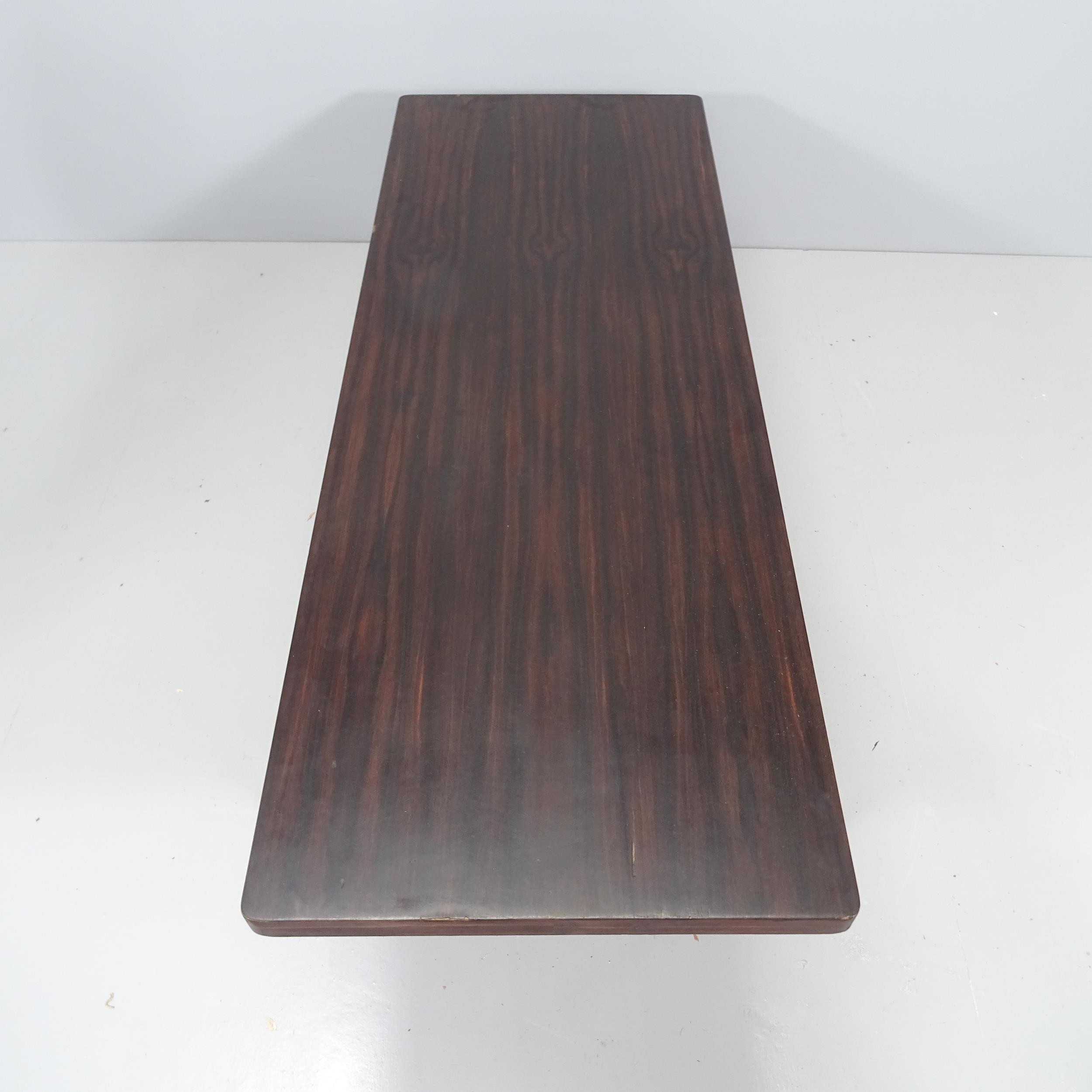 A mid-century coffee table, the stained walnut veneer top on steel base. 140x39x51cm - Image 2 of 2