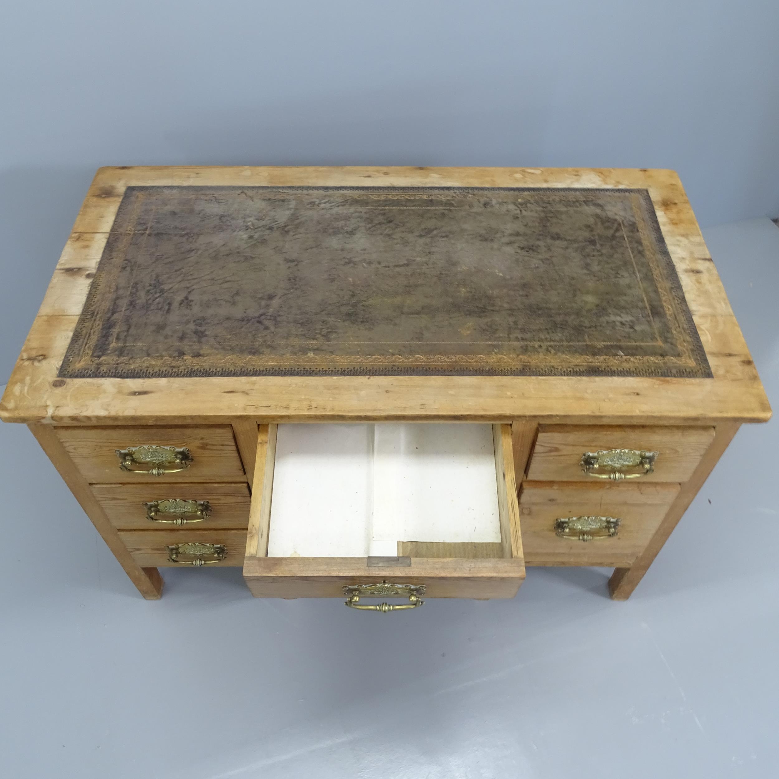 A Vintage pine knee hole writing desk, with six drawers and inset tooled and embossed leather - Image 2 of 2