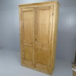 A vintage pine two door wardrobe, with shelf fitted interior. 110x199x40cm