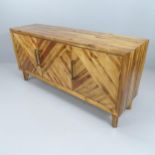 A contemporary three-door sideboard constructed from reclaimed pine. 168x82x48cm