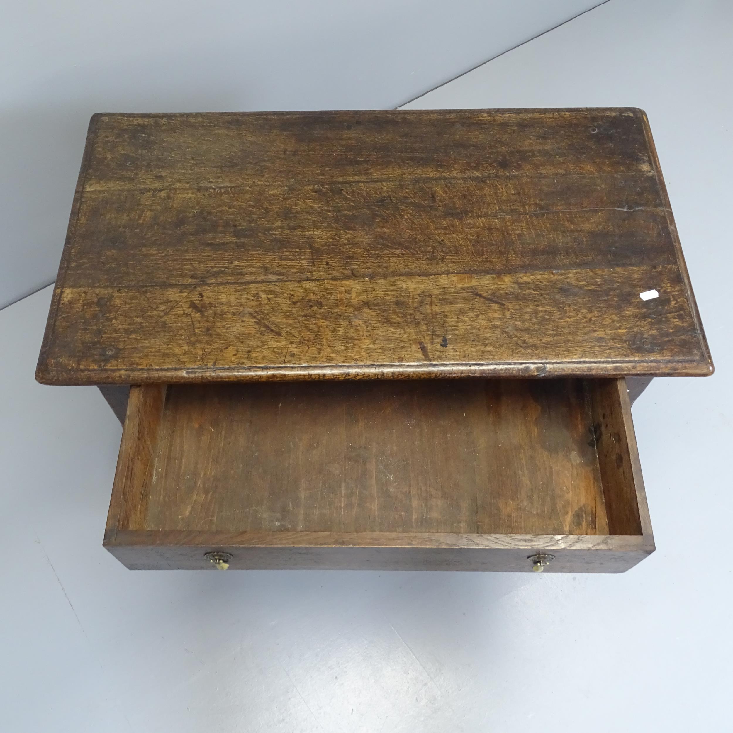 An 18th century oak side table with single frieze drawer, raised on turned legs with all around - Image 2 of 2