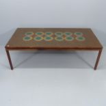 A mid-century rosewood coffee table with copper top. 160x51x80cm