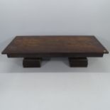 A modern Lombok stained teak plank top coffee table. With maker's label. 160x44x70cm.
