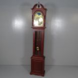 A modern mahogany cased longcase clock, with 10" brass arch-top dial with moon phase subsidiary