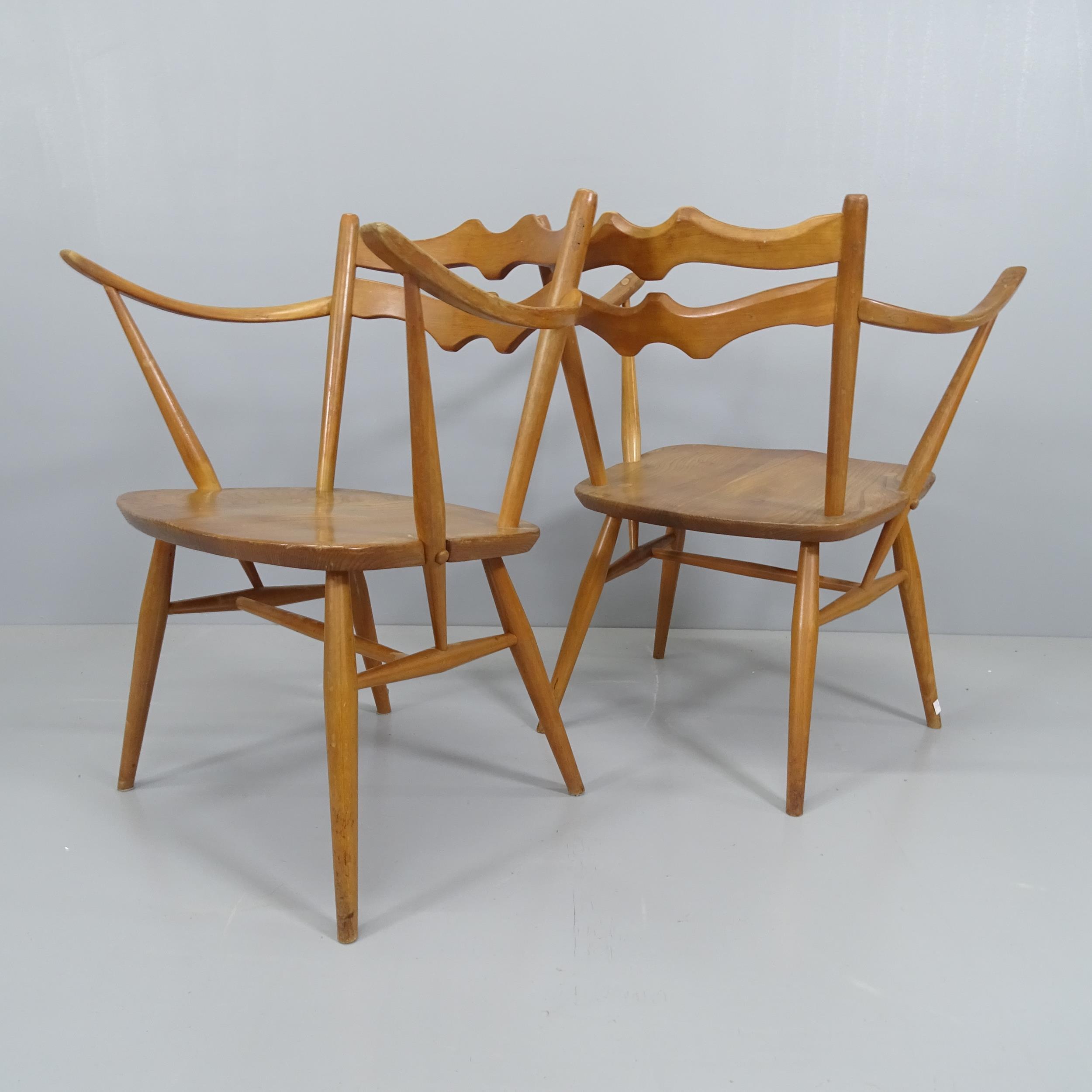 A pair of mid-century Ercol easy chairs in elm and beech. - Image 2 of 2