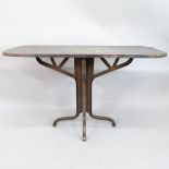 A unique industrial design copper top table on riveted and welded steel base. 135x83x55cm