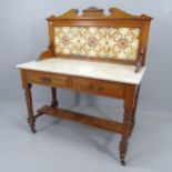 A Victorian walnut marble top washstand, with raised tile top, two frieze drawers and under-tier.