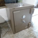 A modern Chubb floor safe. 53x63x60cm With key.