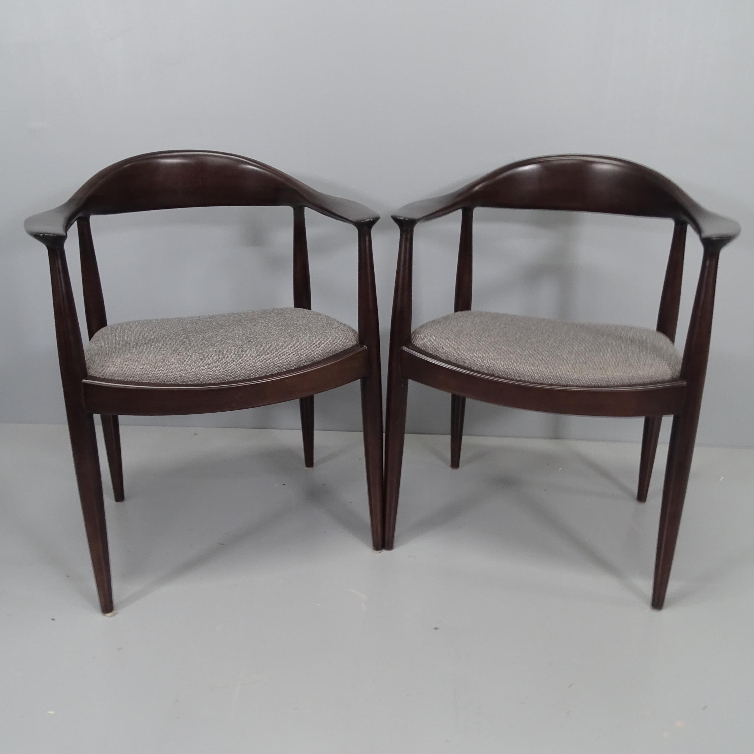 A pair of Hans Wegner Kennedy style armchairs in the mid-century Danish manner. WITH THE OPTION TO