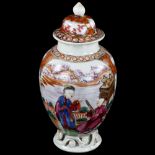 An Antique Chinese porcelain tea jar, with enamelled and gilded decoration on scrolled base,