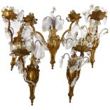 A set of mid-20th century crystal hung gilded brass wall sconces, comprising 4 single light and 1