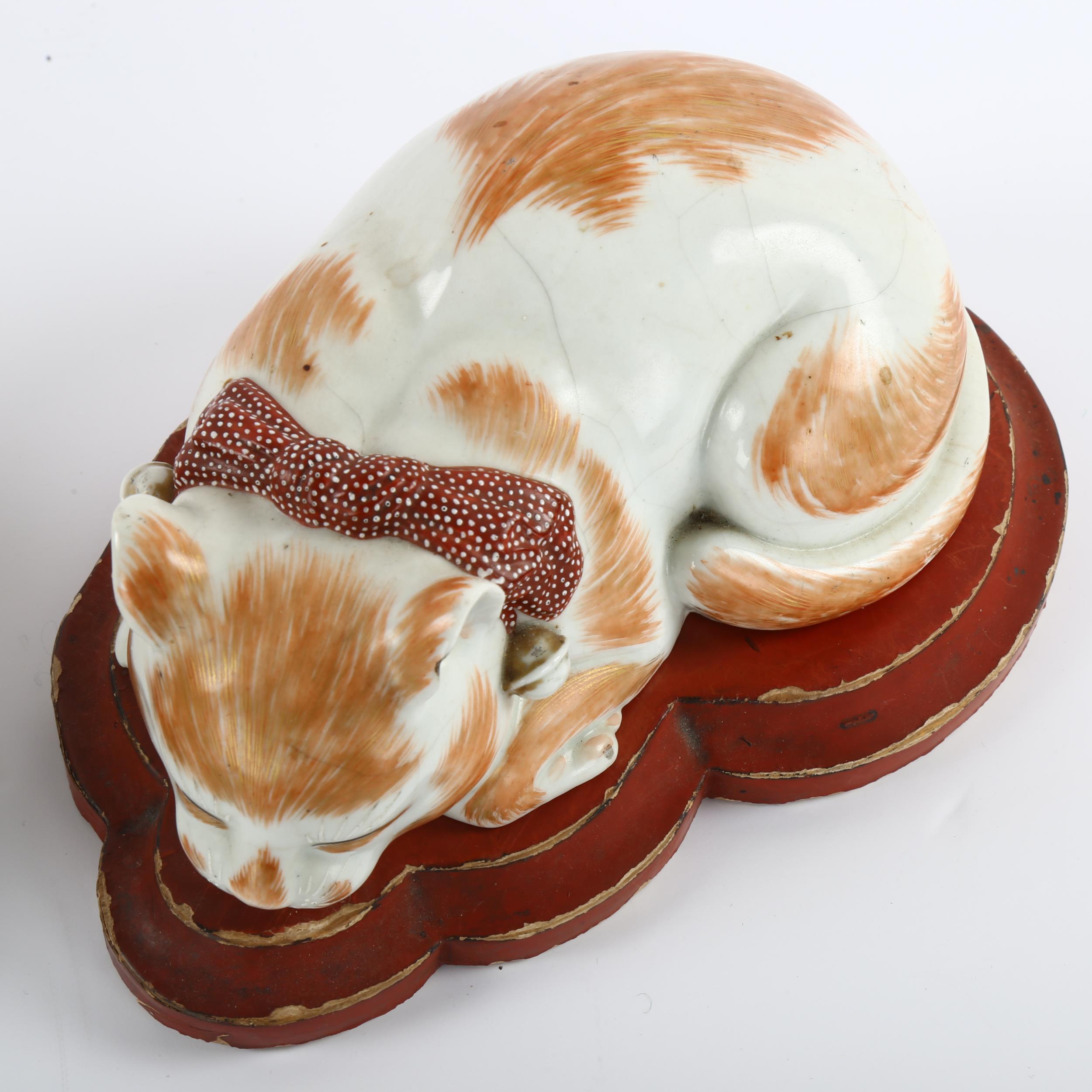 2 similar Japanese, Meiji period, sleeping porcelain cats, on original wooden stands, longest 17.5cm - Image 2 of 3