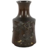 A Japanese bronze vase with relief tree and gilt decoration in mallet form, height 15cm Drilled to