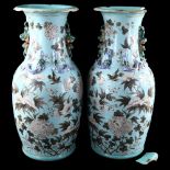 2 large blue glazed Chinese vases with applied dragon and lion decoration, height 47cm, A/F 1 vase