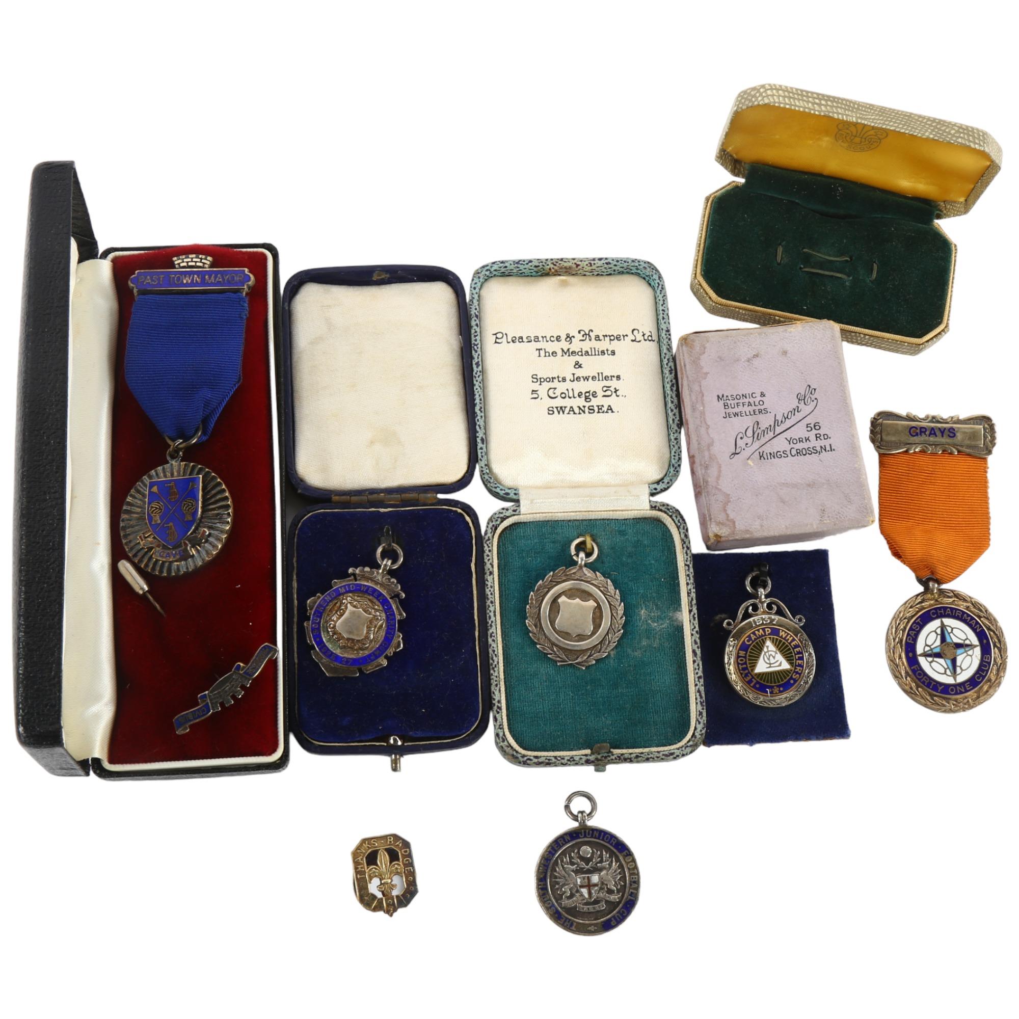 A collection of 8 silver medals and awards, including scouting and sporting interest