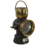 An early 20th century car lamp with brass mounts, maker's label King Of The Road Lucas Limited