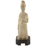 A Chinese ceramic funerary figure on wooden stand, height 29cm No chips cracks or repairs, rubbing