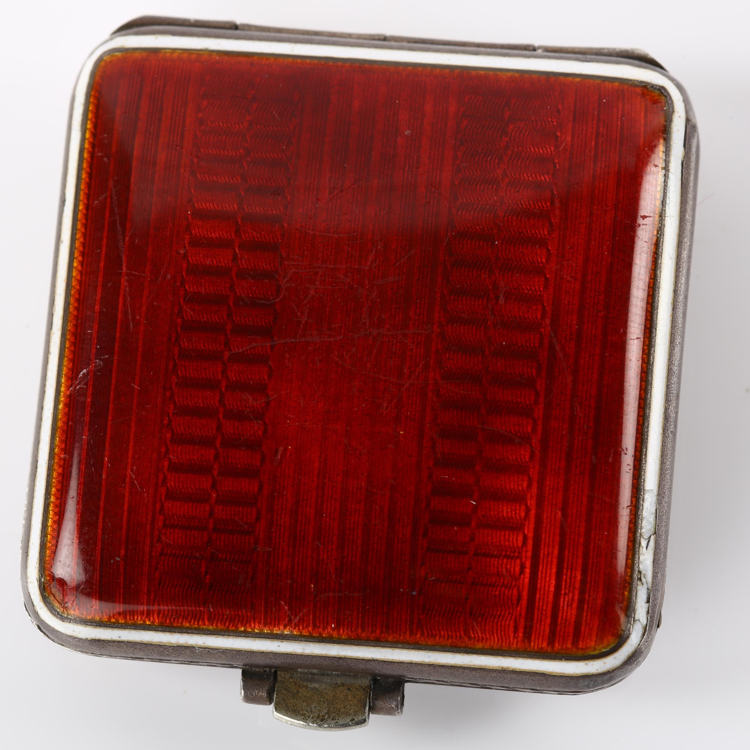 An Art Deco sterling silver and red enamel travelling bedside timepiece, square silvered dial with - Image 2 of 5