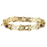 SUFFRAGETTE INTEREST - a 15ct gold amethyst peridot and pearl bracelet, openwork inter-locking