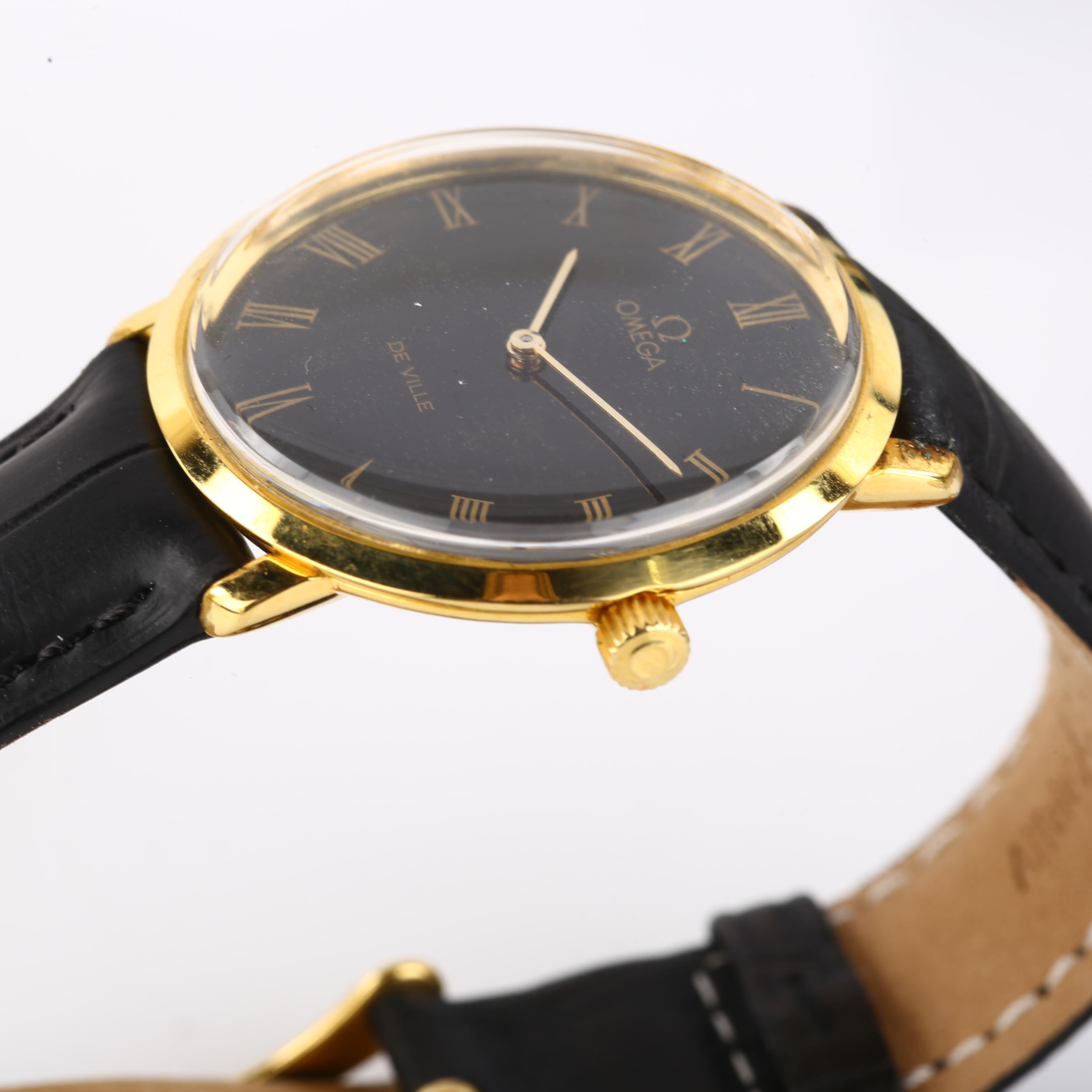 OMEGA - a gold plated De Ville mechanical wristwatch, ref. 111.077, circa 1969, black dial with gilt - Image 4 of 5