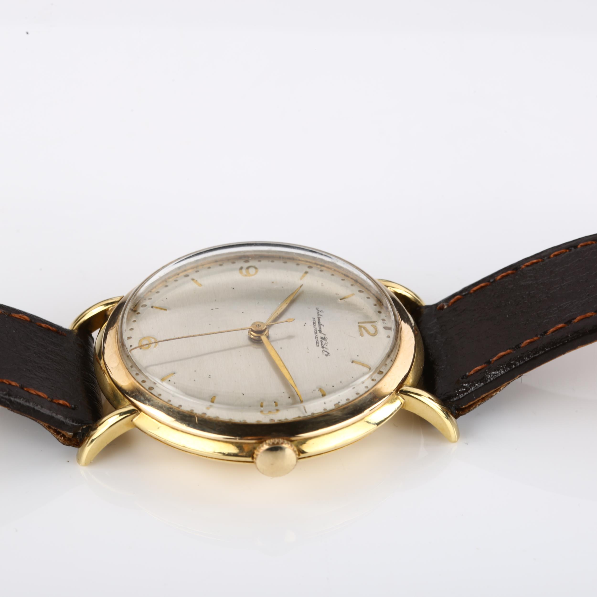 IWC (INTERNATIONAL WATCH CO) - a Vintage 18ct gold mechanical wristwatch, circa 1950s, silvered dial - Image 4 of 5