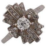 An Art Deco diamond fan cocktail ring, unmarked white metal geometric settings with old European and