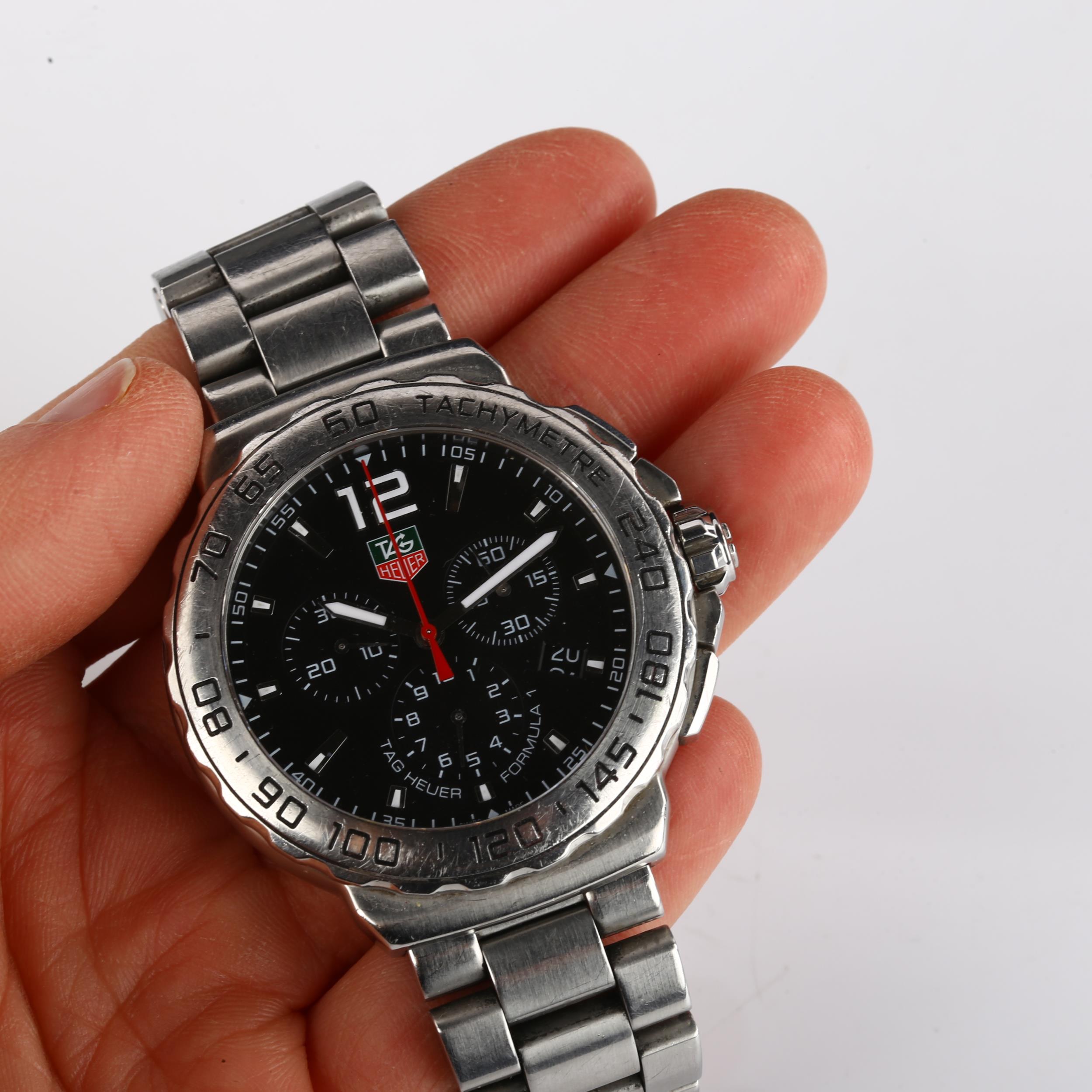 TAG HEUER - a stainless steel Formula 1 quartz chronograph bracelet watch, ref. CAU1112, black - Image 5 of 5