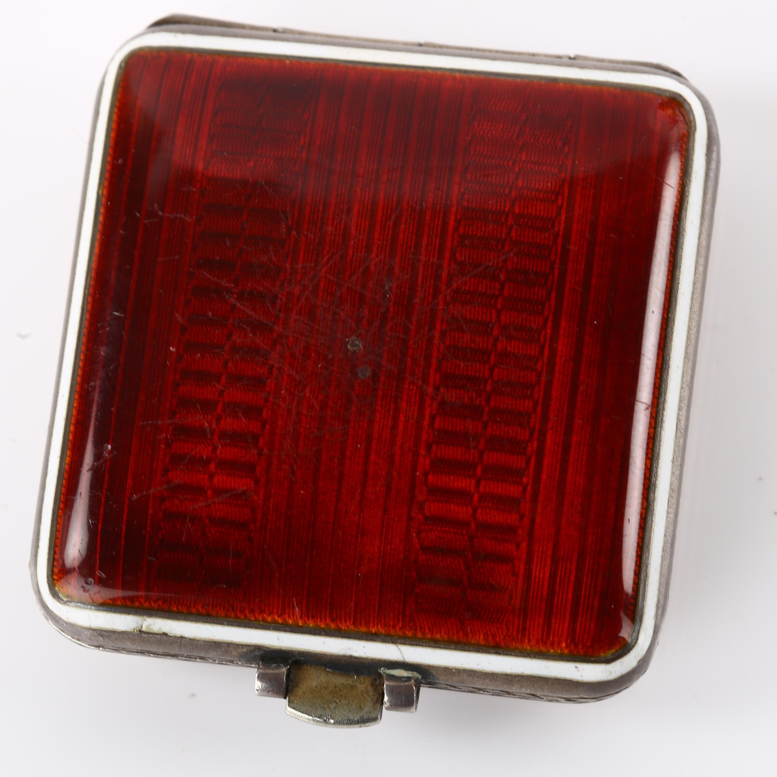 An Art Deco sterling silver and red enamel travelling bedside timepiece, square silvered dial with - Image 3 of 5