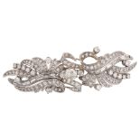 A fine Belle Epoque diamond brooch, ribbon design set with modern round brilliant and baguette-cut