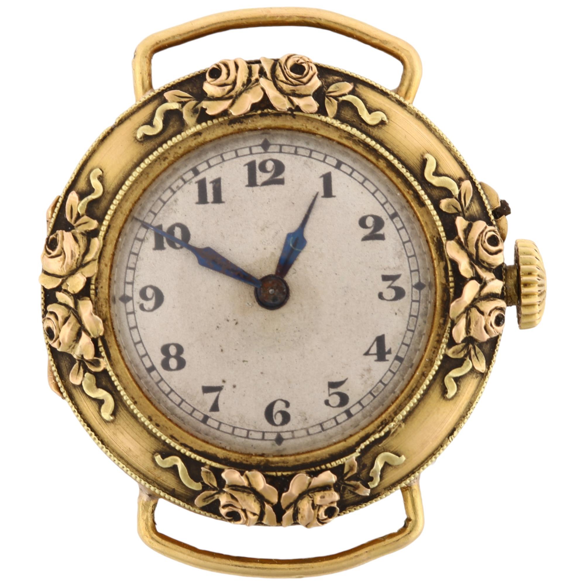 An Art Nouveau French 18k gold mechanical wristwatch head, by Schlussel G, silvered dial with Arabic