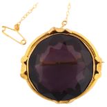 A large Victorian amethyst brooch, unmarked gold frame set with round-cut amethyst, brooch