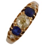 An 18ct gold graduated five stone sapphire and diamond half hoop ring, set with old European and